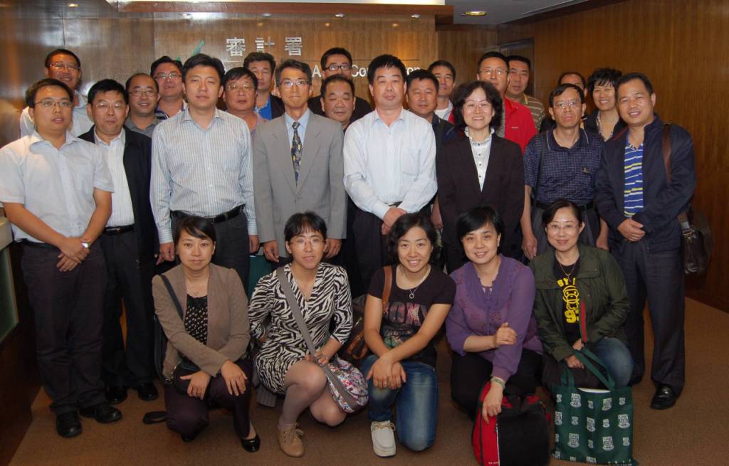 Group photo with officials from the Tianjin Finance Bureau